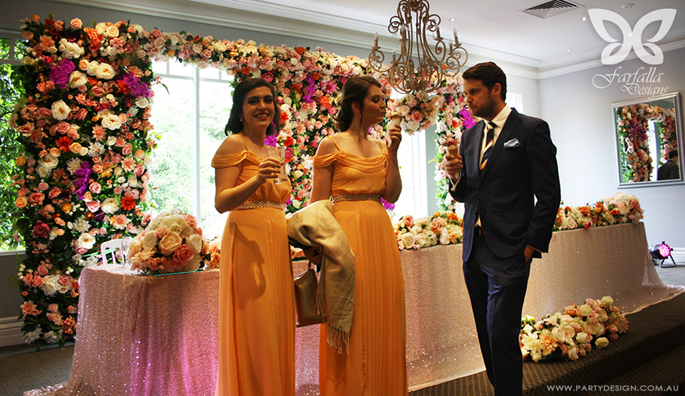 Photo 13.  <b>Peach, Champagne, Fuschia  Orange Flower Wall</b>